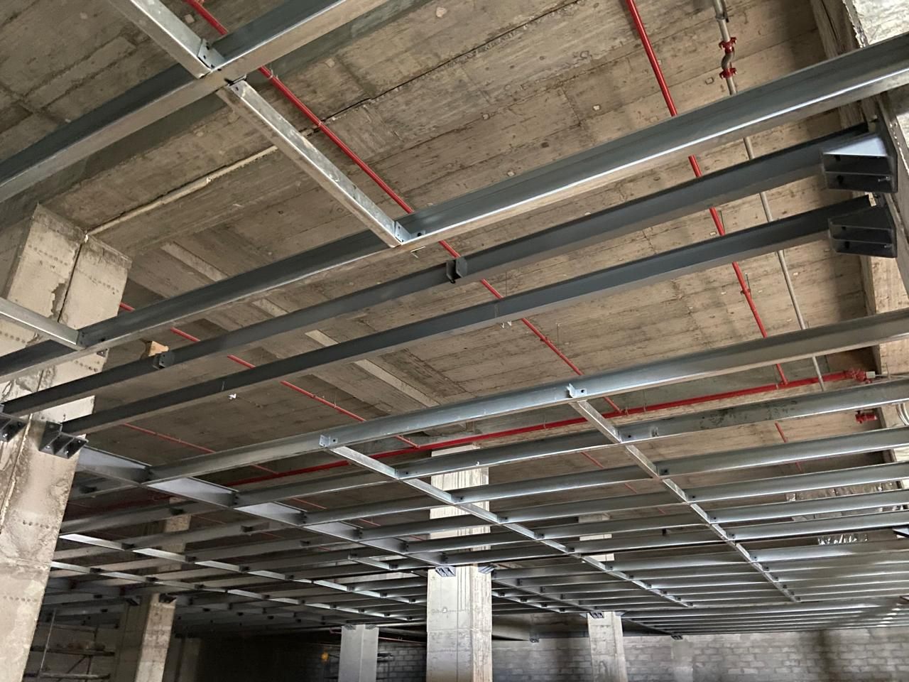 POLYENCO - Plancher sur solives acier suspendu sous une dalle béton